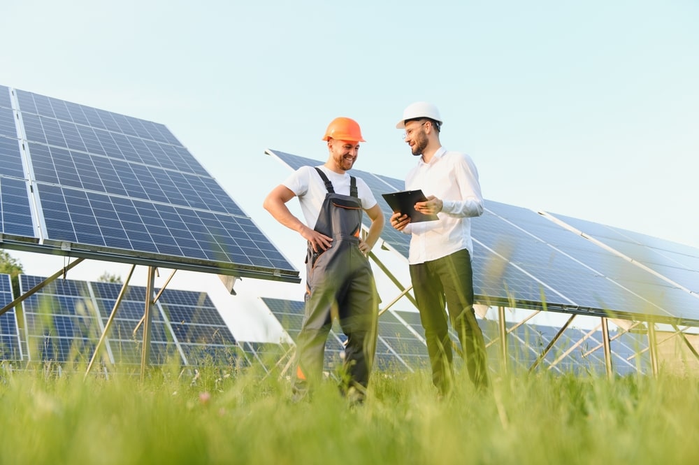 2 engineers at a solar farm