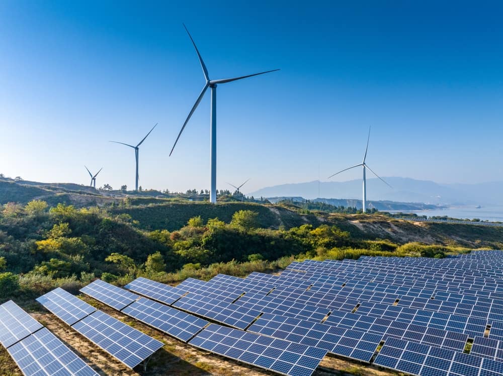 Solar Panel Farms with Wind Turbines in the background