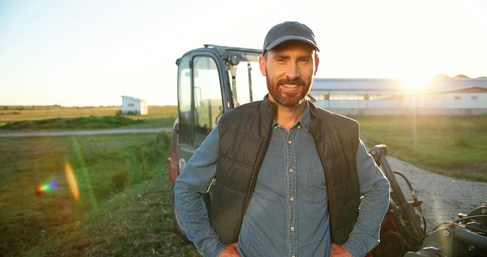 Farmer standing in a field