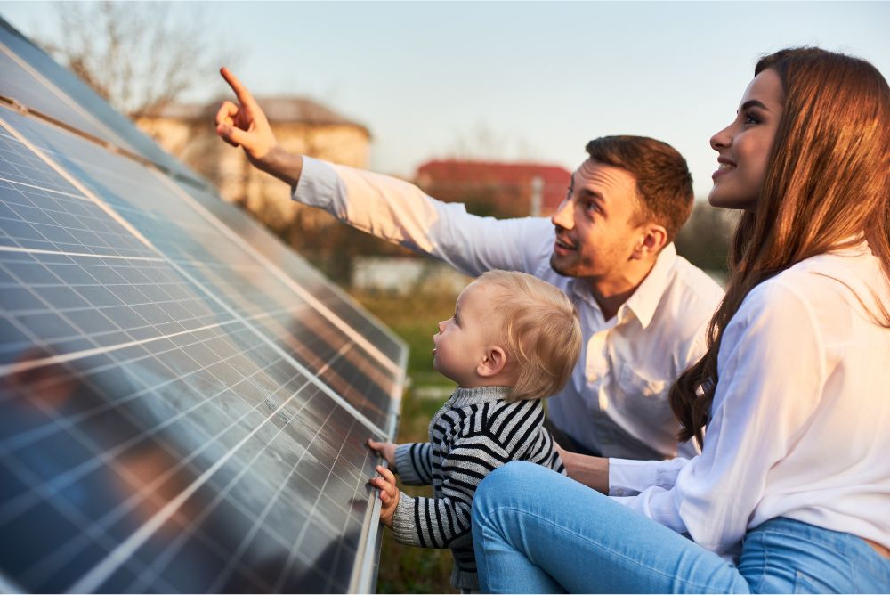 solar_panel_with_family family with child exploring solar panels